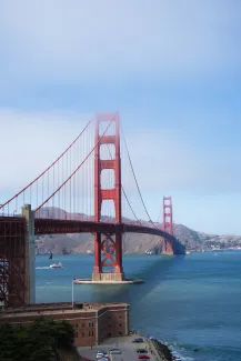 alcatraz bridge with fog during daytime by Michaela courtesy of Unsplash.