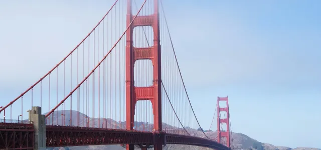 alcatraz bridge with fog during daytime by Michaela courtesy of Unsplash.